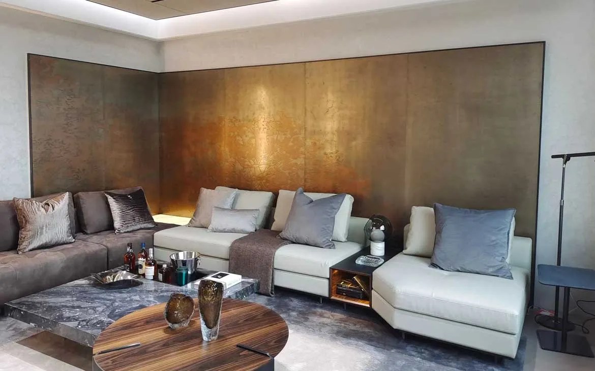 Metallic feature wall in a contemporary living room